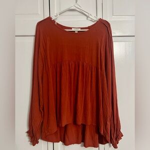 Umgee top. Size Large. Like new condition. Rusty burnt orange/red color.